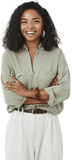 A smiling woman with her arms crossed